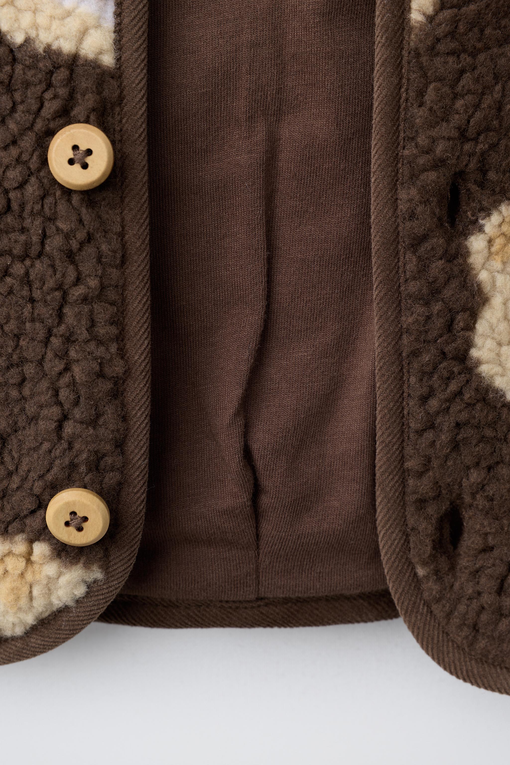 BLOUSON EFFET MOUTON IMPRIMÉ OURS